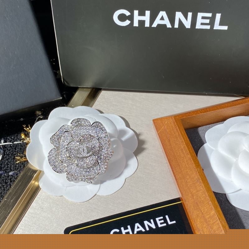 Ch*el brooches